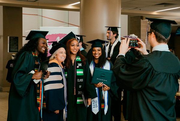 MGA students posing for pic at commencement